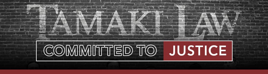Tamaki_Practice-Area_Government-Lawsuits Tamaki Law painted on a brick wall in Yakima, WA